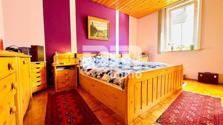 Ein- Zweifamilienhaus mit Innenhof, Balkon, Dachterrasse + Garage und zusätzliche Nutzflächen - WE1 Hochparterre / Schlafzimmer